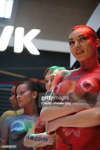 Germany, Hannover, Promoter at the CeBit 2006; bodypainting.