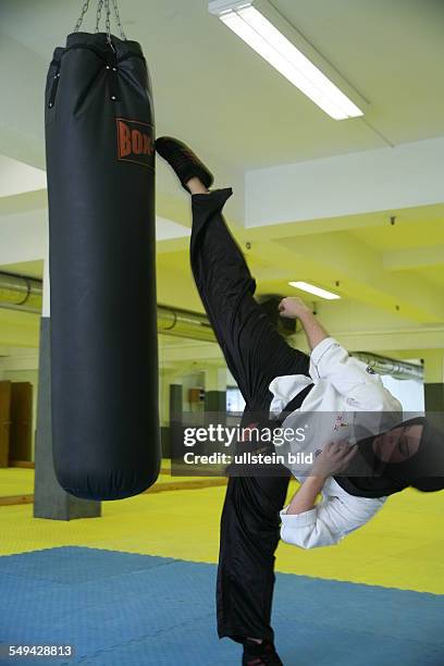 Germany, Duisburg - Marxloh: Tuba Senol, 18 years old, taekwondo. World champion, European champion and several times German champion; weight class...