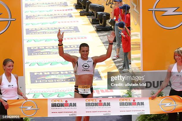 Germany, Frankfurt: Ironman. - Look at a participant at the finish.