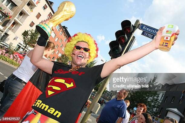 Germany, Dortmund: Match Germany versus Italia: Geraman fan as superman