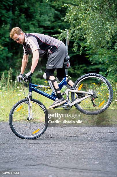 Germany: Free time.- Riding a mountainbike.