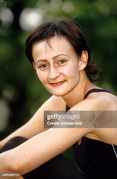 Germany: Free time.- Portrait of a young woman.