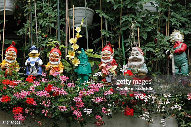 Garden Gnomes on a balcony, Munich, Germany