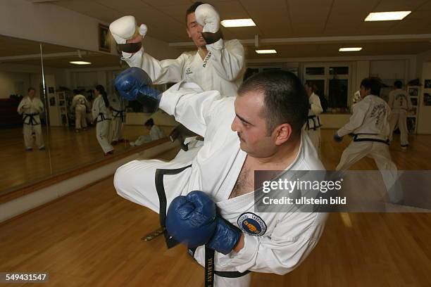 Germany. Yildiray Kara, 34 years, police inspector with turkish origin. Yildiray Kara is practicing Taekwon-Do supervised by MA. Master Byong - Ho...