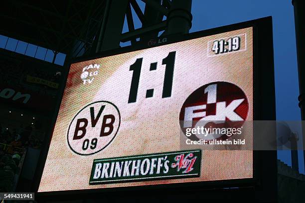 Germany: A soccer stadium.- View at the illuminated scoreboard.