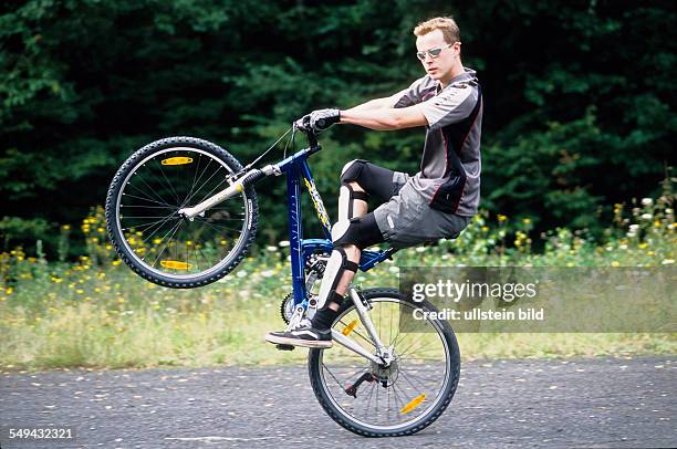 Germany: Free time.- Riding a mountainbike.