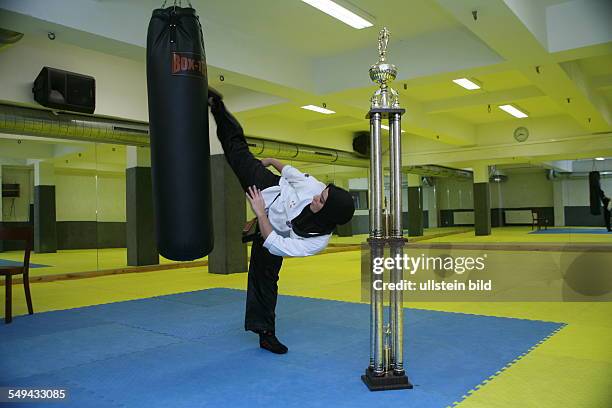 Germany, Duisburg - Marxloh: Tuba Senol, 18 years old, taekwondo. World champion, European champion and several times German champion; weight class...