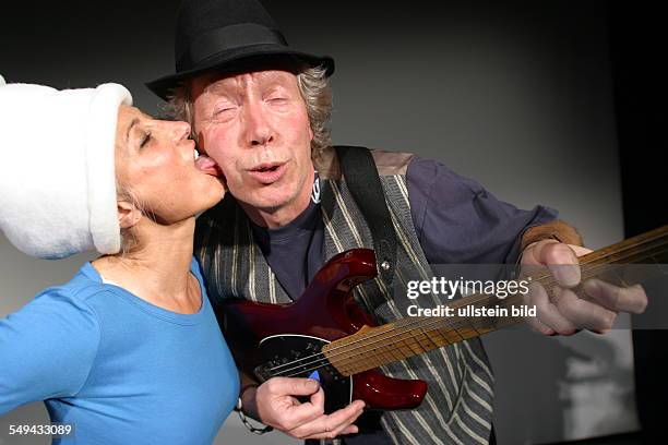 Germany: Portrait of a couple in fancy dresses.