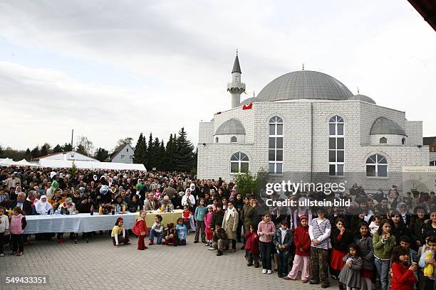 Germany, Luenen: Selimiye Mosque: Opening ceremony . The guests and visitors in front of the mosque.