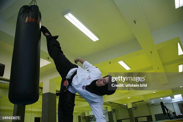 Germany, Duisburg - Marxloh: Tuba Senol, 18 years old, taekwondo. World champion, European champion and several times German champion; weight class...