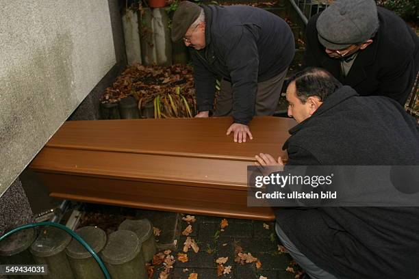 Germany, Marl, a deceased member of the turkish community is brought in the cleaning rooms of a mosque. Here the body will be cleaned before the body...