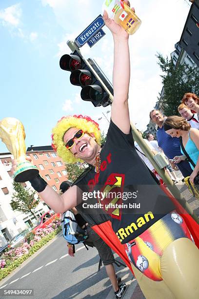 Germany, Dortmund: Match Germany versus Italia: Geraman fan as superman