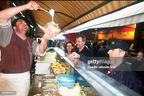 Austria, Vienna: Turks in Vienna.- Nibbling market; a doner kebab stall.