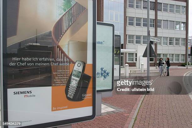 Germany: The of the Siemens AG Information and Communication Mobile in Bocholt; advertising.