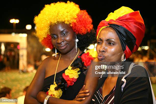 Germany, Dortmund: Match Germany versus Italia: 2 women from Kenia are sad about the game.