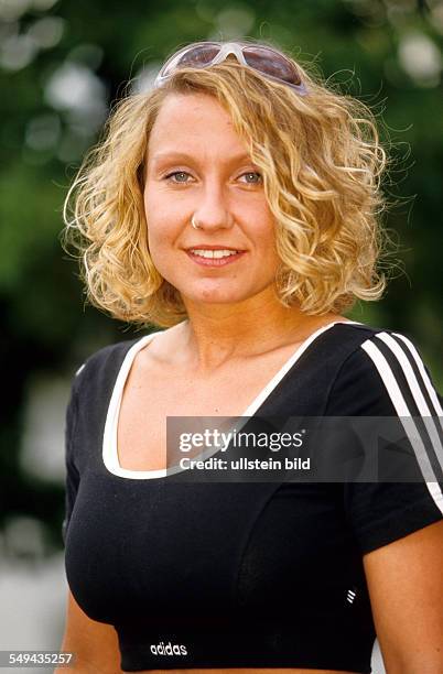 Germany: Free time.- Portrait of a young woman.