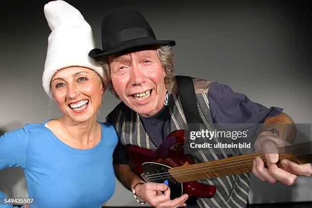 Germany: Portrait of a couple in fancy dresses.