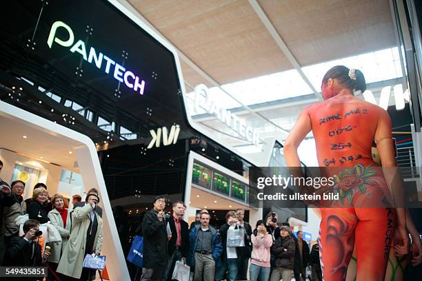 Germany, Hannover Promoter at the CeBit 2006; bodypainting.