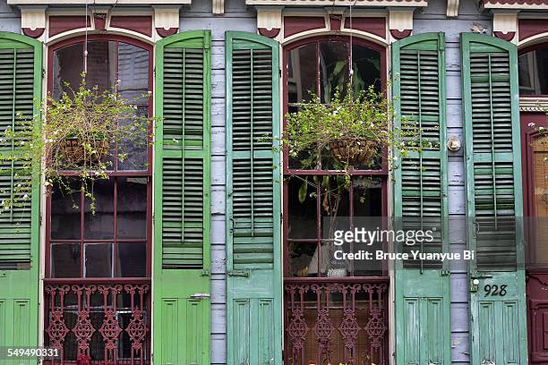 facade of a old shotgun house in french quarter - new orleans houses stock pictures, royalty-free photos & images