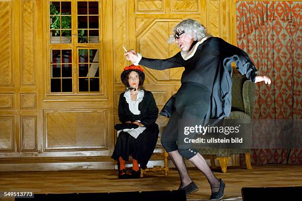 Performance of Moliere's comedy "The Miser" in the Volksbühne, Berlin; scene with Irina Kastrinidis and Martin Wuttke - director: Frank Castorf -...