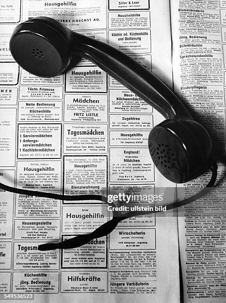 Germany, earphone and newspaper job advertisments in the sixties