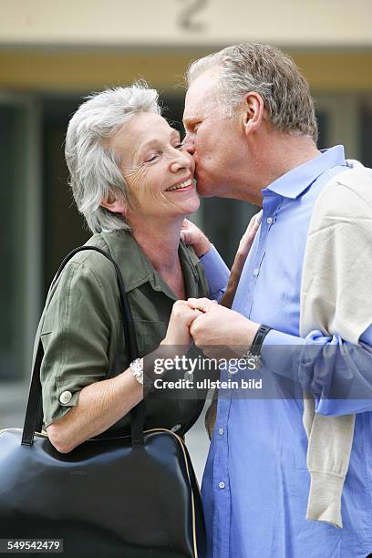 Bonn: Living in old age: Seniors couple taking a walk.