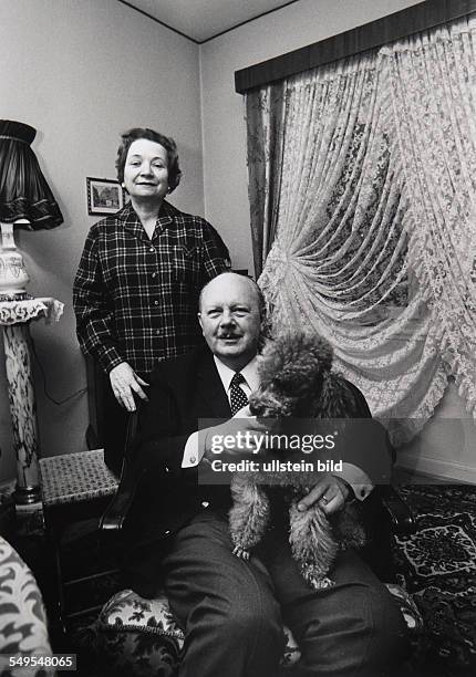 Germany, Hamburg, elderly married couple with dog.