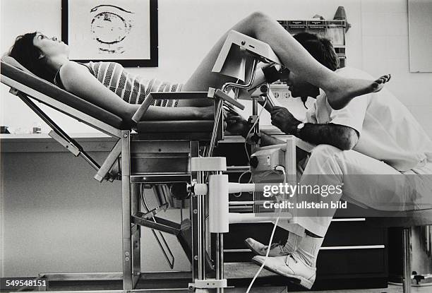 Germany, Hamburg, young woman examined by the gynaecologist.