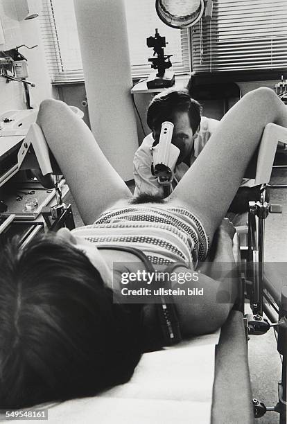 Germany, Hamburg, young woman examined by the gynaecologist.