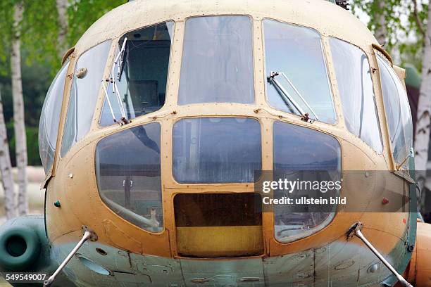 Cottbus: Mi-8IV - Airborne command post characterized by antennas, and Doppler radar on tail boom . Inside the Cottbus Airport museum. History of the...