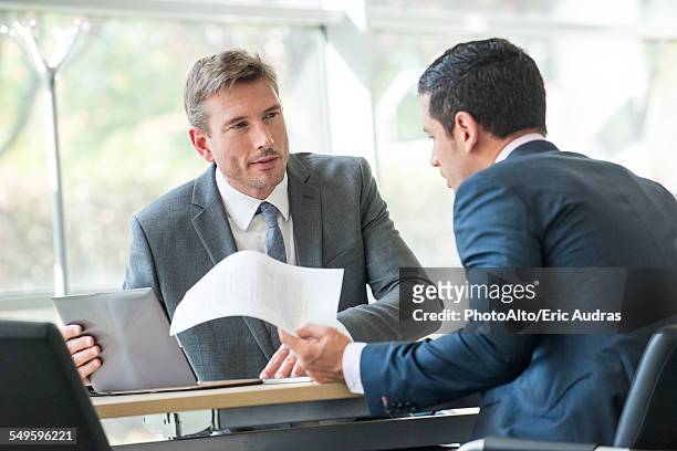 businessmen negotiating in meeting - lawyers serious stock pictures, royalty-free photos & images