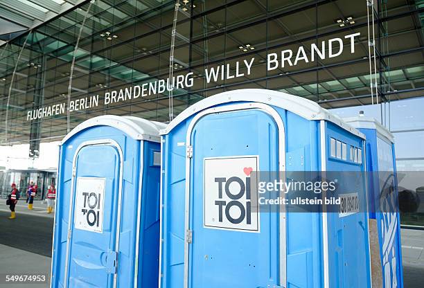 The airport Berlin Brandenburg Willy Brandt BER , to be opened in October 2013 : toilets for the construction workers in front of the terminal...