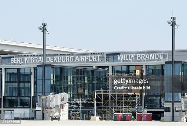 The airport Berlin Brandenburg Willy Brandt BER , to be opened in October 2013 : view from the apron on the terminal building