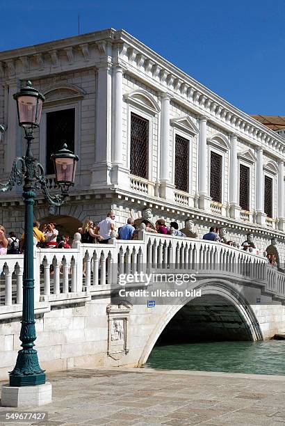 Doge's Palace Palazzo Ducale with the Straw bridge Ponte della Paglia in Venice.