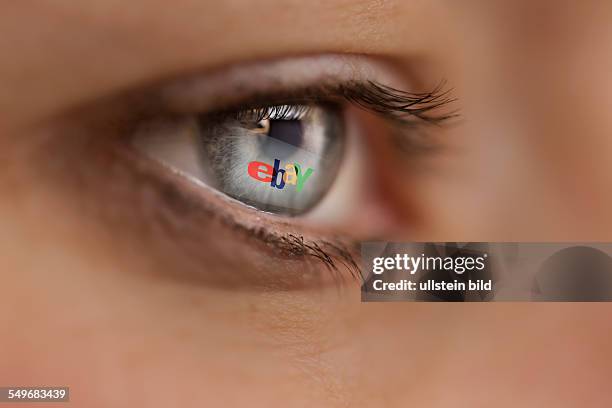 Woman looking at the internet site of the online auctioneer ebay.