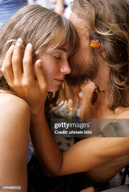 Young loving couple kissing, tender love, hippies on Ibiza