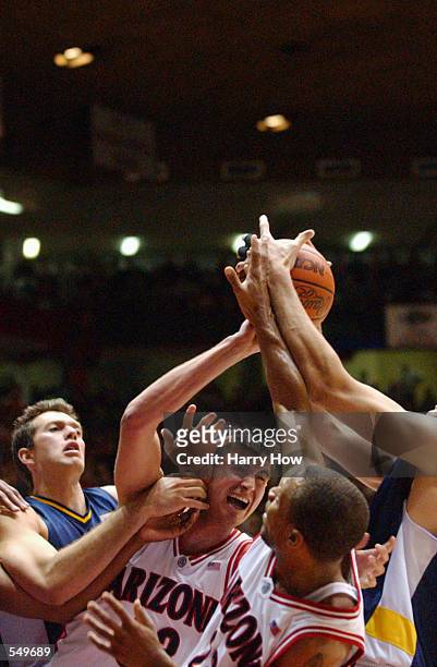 Rick Anderson of Arizona fights for a loose ball during the first round of the NCAA Baketball Tournament game against UCSB at The Pit in Albuquerque,...