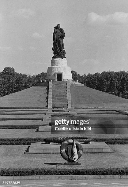 German Democratic Republic Bezirk Berlin East Berlin: Soviet War Memorial - Statue by Jewgeni Wutschetitsch of an Red Army soldier with Child and...