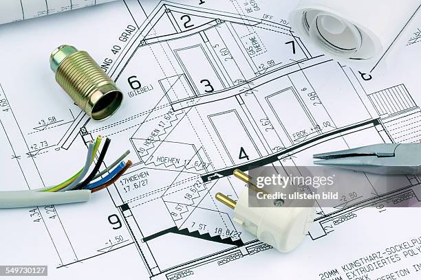 Ein Bauplan eines Architekten für den Bau eines neuen Wohnhauses. Symbolfoto für Finanzierung und Planung eines neuen Hauses.