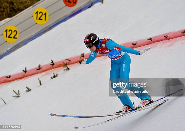 Sieger Anders Jacobsen landet im Telemark waehrend dem FIS Skispringen Weltcup bei der 61. Vierschanzentournee, am 1. Januar 2013 in Garmisch...