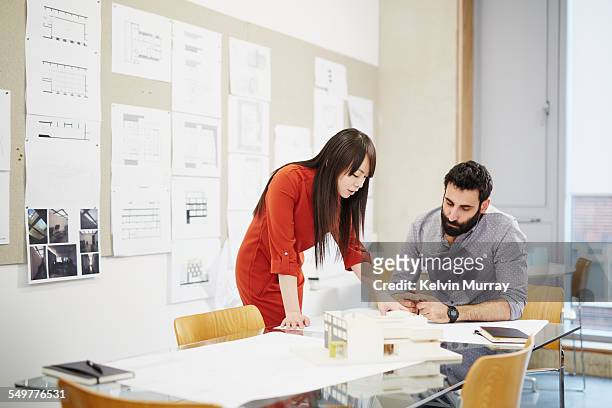 shoreditch office - woman table standing stock pictures, royalty-free photos & images