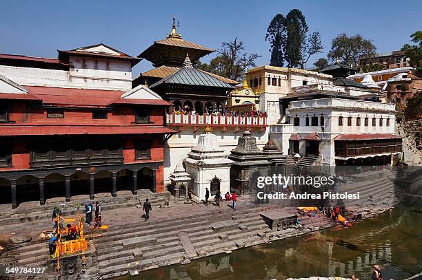 historic pashupatinath burial temple, kathmandu - pashupatinath stock-fotos und bilder