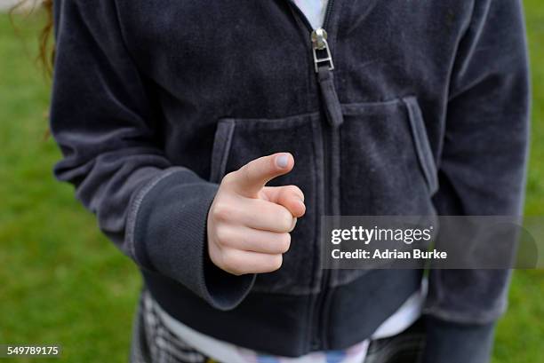 small girl wagging finger - shaking finger stock pictures, royalty-free photos & images