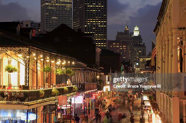 night view of bourbon street - new orleans stock-fotos und bilder