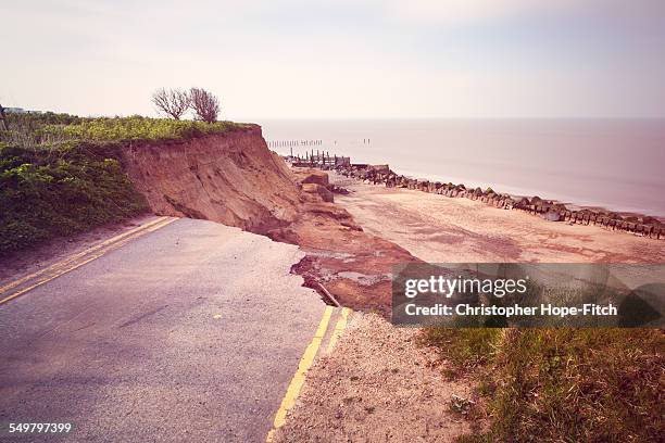 eroded road - eroded stock pictures, royalty-free photos & images