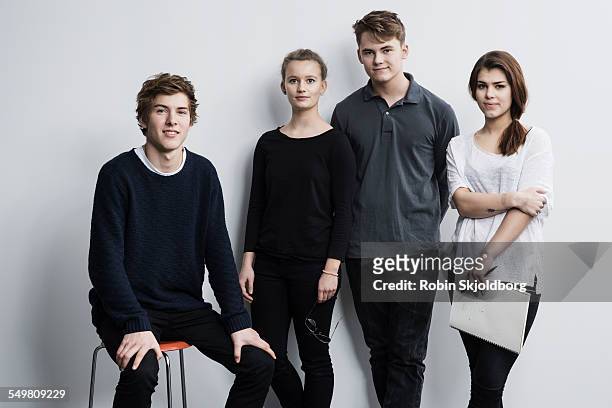 portrait of young men and women - four people stock pictures, royalty-free photos & images