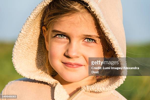 girl wearing hooded jacket, portrait - alexandra dost stock-fotos und bilder