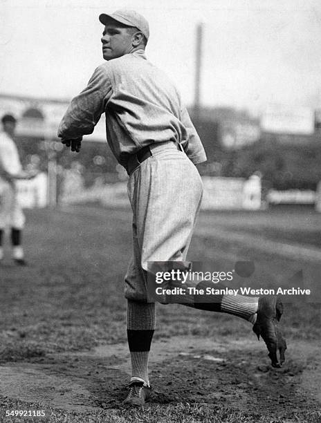 Pitcher Babe Ruth of the Boston Red Sox warms up before a game circa 1918.