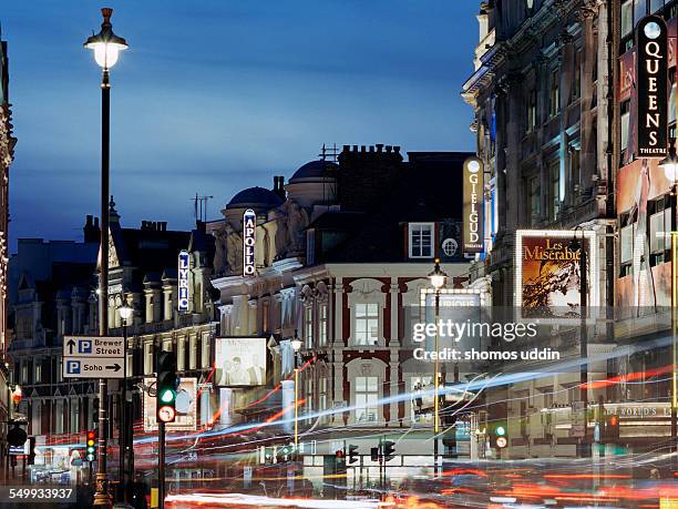 london's shaftesbury avenue at dusk - soho london fotografías e imágenes de stock