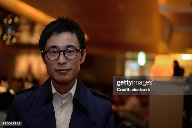 portrait of a young man - open collar stock pictures, royalty-free photos & images